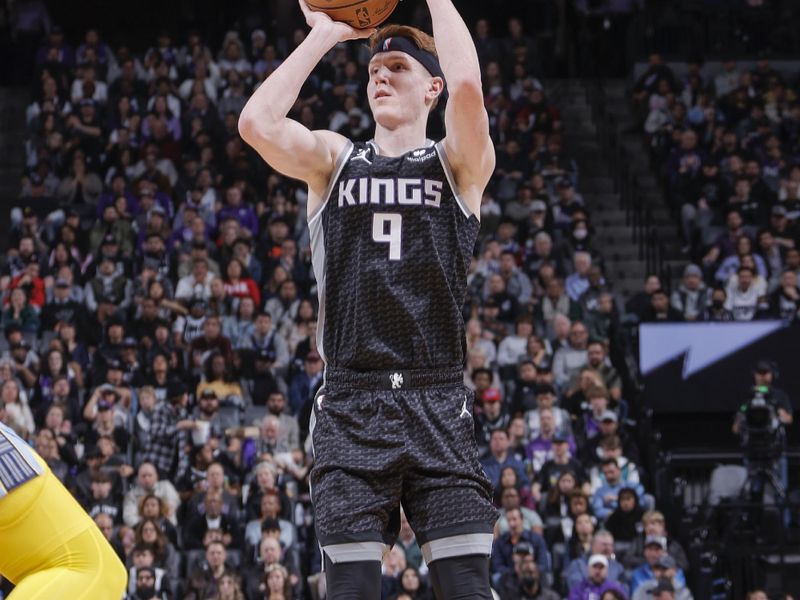 SACRAMENTO, CA - JANUARY 23:  Kevin Huerter #9 of the Sacramento Kings shoots the ball during the game against the  Memphis Grizzlies  on January 23, 2023 at Golden 1 Center in Sacramento, California. NOTE TO USER: User expressly acknowledges and agrees that, by downloading and or using this Photograph, user is consenting to the terms and conditions of the Getty Images License Agreement. Mandatory Copyright Notice: Copyright 2023 NBAE (Photo by Rocky Widner/NBAE via Getty Images)