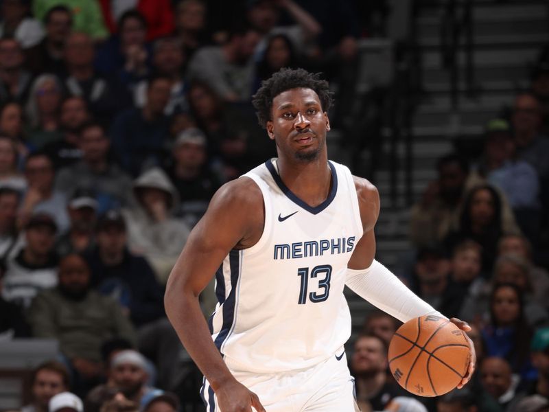 MINNEAPOLIS, MN -  FEBRUARY 28: Jaren Jackson Jr. #13 of the Memphis Grizzlies handles the ball during the game  on February 28, 2024 at Target Center in Minneapolis, Minnesota. NOTE TO USER: User expressly acknowledges and agrees that, by downloading and or using this Photograph, user is consenting to the terms and conditions of the Getty Images License Agreement. Mandatory Copyright Notice: Copyright 2024 NBAE (Photo by David Sherman/NBAE via Getty Images)