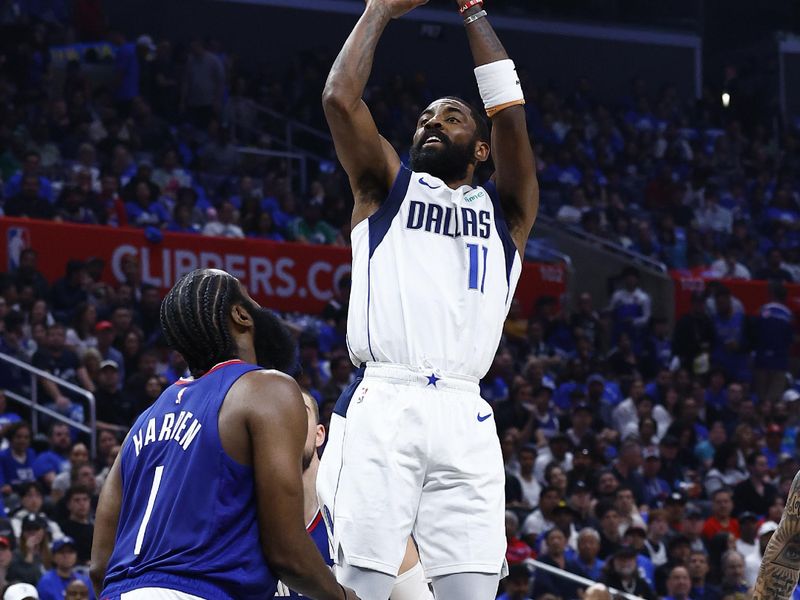 LOS ANGELES, CALIFORNIA - APRIL 21:  Kyrie Irving #11 of the Dallas Mavericks takes a shot against James Harden #1 of the LA Clippers in the second half during game one of the Western Conference First Round Playoffs at Crypto.com Arena on April 21, 2024 in Los Angeles, California.   NOTE TO USER: User expressly acknowledges and agrees that, by downloading and/or using this photograph, user is consenting to the terms and conditions of the Getty Images License Agreement.  (Photo by Ronald Martinez/Getty Images)