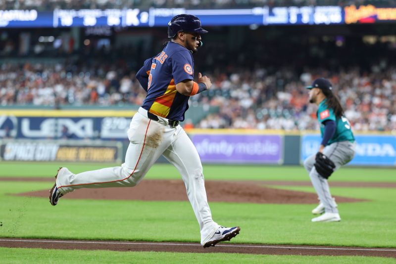 May 25, 2025; Houston, Texas, USA; Houston Astros third baseman Isaac Paredes (15) rounds third base and scores a run during the third inning against the Seattle Mariners at Daikin Park. Mandatory Credit: Troy Taormina-Imagn Images