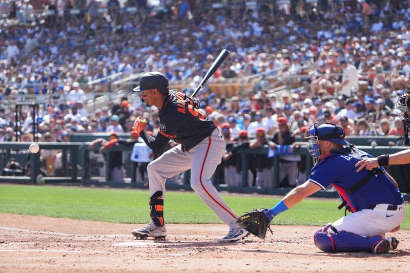 Mar 1, 2025; Phoenix, Arizona, USA; San Francisco Giants second baseman Sergio Alcantara (50) bats against the Los Angeles Dodgers during the second inning at Camelback Ranch-Glendale. Mandatory Credit: Joe Camporeale-Imagn Images