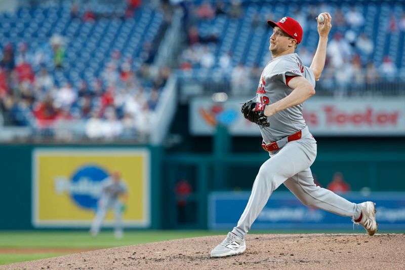 May 9, 2025; Washington, District of Columbia, USA; St. Louis Cardinals starting pitcher Erick Fedde (12) pitches against the Washington Nationals during the second inning at Nationals Park. Mandatory Credit: Geoff Burke-Imagn Images