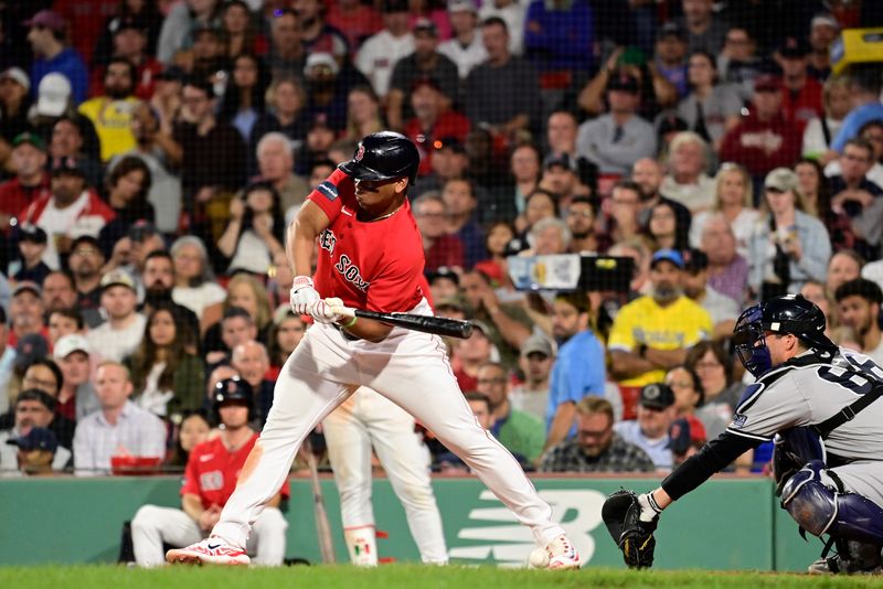 Sep 14, 2023; Boston, Massachusetts, USA; Boston Red Sox designated hitter Rafael Devers (11) is hit in the foot by a pitch from New York Yankees starting pitcher Clarke Schmidt (not pictured) during the fifth inning at Fenway Park. Mandatory Credit: Eric Canha-USA TODAY Sports