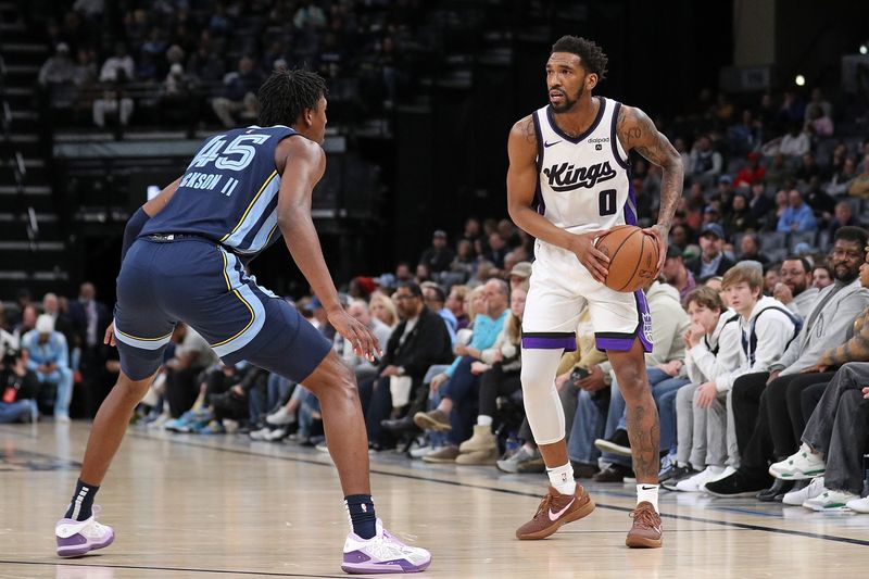 MEMPHIS, TENNESSEE - JANUARY 29: Malik Monk #0 of the Sacramento Kings handles the ball against GG Jackson #45 of the Memphis Grizzlies during the second half at FedExForum on January 29, 2024 in Memphis, Tennessee. NOTE TO USER: User expressly acknowledges and agrees that, by downloading and or using this photograph, User is consenting to the terms and conditions of the Getty Images License Agreement. (Photo by Justin Ford/Getty Images)