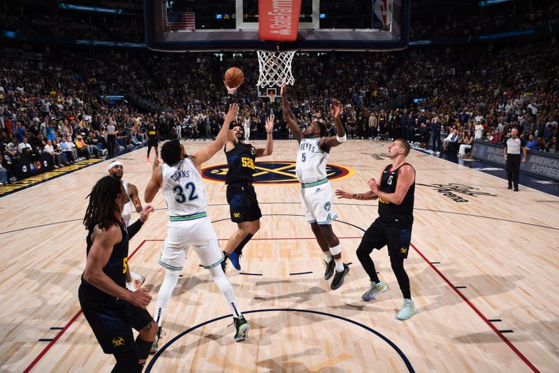 DENVER, CO - MAY 19:  Jamal Murray #27 of the Denver Nuggets goes to the basket during the game against the Minnesota Timberwolves during Round 2 Game 7 of the 2024 NBA Playoffs  on May 19, 2024 at the Ball Arena in Denver, Colorado. NOTE TO USER: User expressly acknowledges and agrees that, by downloading and/or using this Photograph, user is consenting to the terms and conditions of the Getty Images License Agreement. Mandatory Copyright Notice: Copyright 2024 NBAE (Photo by Garrett Ellwood/NBAE via Getty Images)