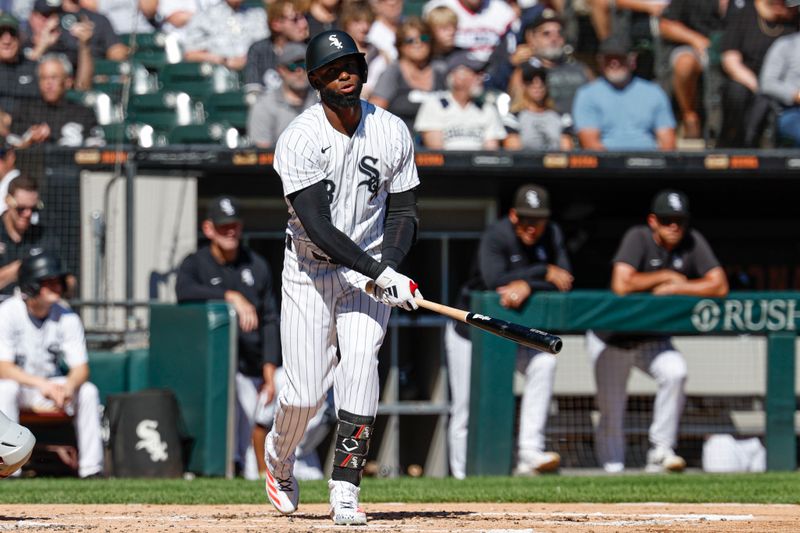 Sep 26, 2024; Chicago, Illinois, USA; Chicago White Sox outfielder Luis Robert Jr. (88) reacts after striking out against the Los Angeles Angels during the third inning at Guaranteed Rate Field. Mandatory Credit: Kamil Krzaczynski-Imagn Images