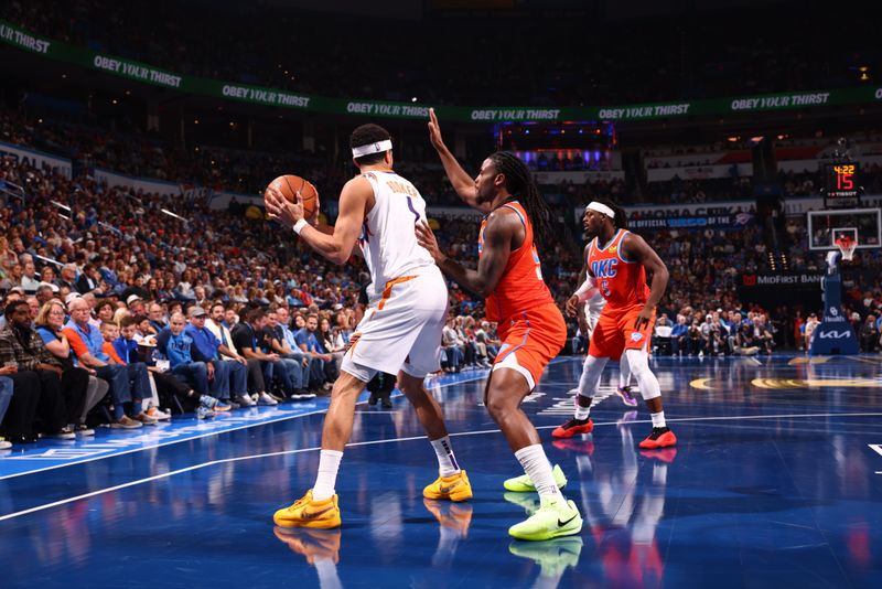 OKLAHOMA CITY, OK - NOVEMBER 15: Devin Booker #1 of the Phoenix Suns handles the ball during the game against the Oklahoma City Thunder during the Emirates NBA Cup game on November 15, 2024 at Paycom Center in Oklahoma City, Oklahoma. NOTE TO USER: User expressly acknowledges and agrees that, by downloading and or using this photograph, User is consenting to the terms and conditions of the Getty Images License Agreement. Mandatory Copyright Notice: Copyright 2024 NBAE (Photo by Zach Beeker/NBAE via Getty Images)