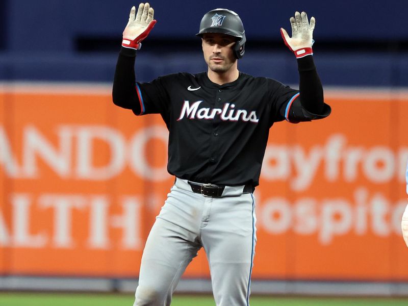 Jul 30, 2024; St. Petersburg, Florida, USA;  Miami Marlins catcher Nick Fortes (4) celebrates after he doubles against the Tampa Bay Rays during the seventh inning at Tropicana Field. Mandatory Credit: Kim Klement Neitzel-USA TODAY Sports