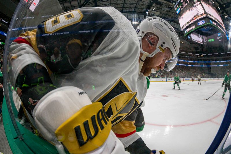 Apr 24, 2024; Dallas, Texas, USA; Vegas Golden Knights right wing Anthony Mantha (39) battles for control of the puck in the Dallas Stars zone in the first period in game two of the first round of the 2024 Stanley Cup Playoffs at American Airlines Center. Mandatory Credit: Jerome Miron-USA TODAY Sports