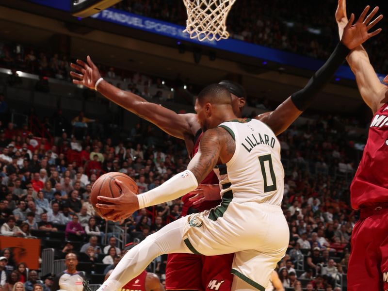 MIAMI, FL - NOVEMBER 26: Damian Lillard #0 of the Milwaukee Bucks rebounds the ball during the game against the Miami Heat during the Emirates NBA Cup game on November 26, 2024 at Kaseya Center in Miami, Florida. NOTE TO USER: User expressly acknowledges and agrees that, by downloading and or using this Photograph, user is consenting to the terms and conditions of the Getty Images License Agreement. Mandatory Copyright Notice: Copyright 2024 NBAE (Photo by Issac Baldizon/NBAE via Getty Images)