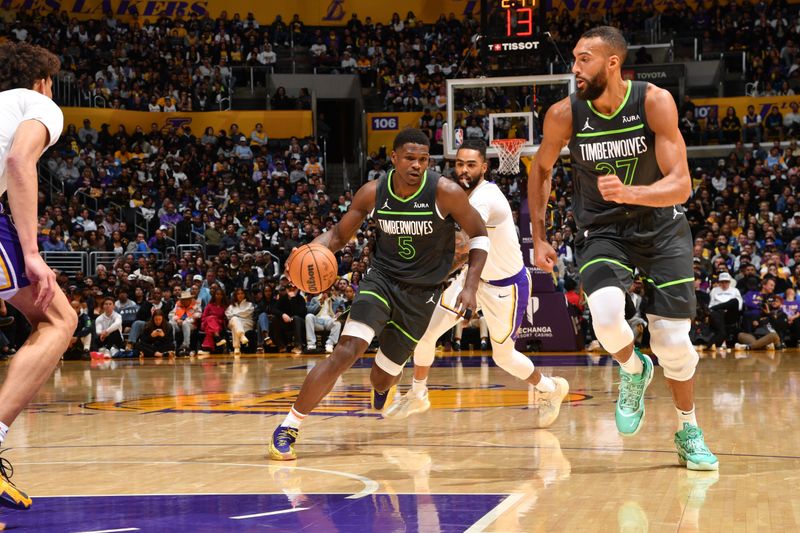 LOS ANGELES, CA - APRIL 7: Anthony Edwards #5 of the Minnesota Timberwolves dribbles the ball during the game against the Los Angeles Lakers on April 7, 2024 at Crypto.Com Arena in Los Angeles, California. NOTE TO USER: User expressly acknowledges and agrees that, by downloading and/or using this Photograph, user is consenting to the terms and conditions of the Getty Images License Agreement. Mandatory Copyright Notice: Copyright 2024 NBAE (Photo by Juan Ocampo/NBAE via Getty Images)