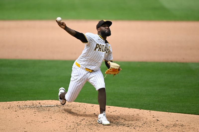 May 29, 2024; San Diego, California, USA; San Diego Padres pitcher Enyel De Los Santos (62) pitches during the sixth inning against the Miami Marlins  at Petco Park. Mandatory Credit: Denis Poroy-USA TODAY Sports