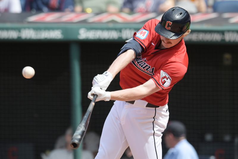 May 8, 2024; Cleveland, Ohio, USA; Cleveland Guardians pinch hitter Kyle Manzardo (9) hits a single during the seventh inning against the Detroit Tigers at Progressive Field. Mandatory Credit: Ken Blaze-USA TODAY Sports