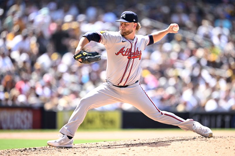 Jul 14, 2024; San Diego, California, USA; Atlanta Braves relief pitcher A.J. Minter (33) pitches against the San Diego Padres during the seventh inning at Petco Park. Mandatory Credit: Orlando Ramirez-USA TODAY Sports