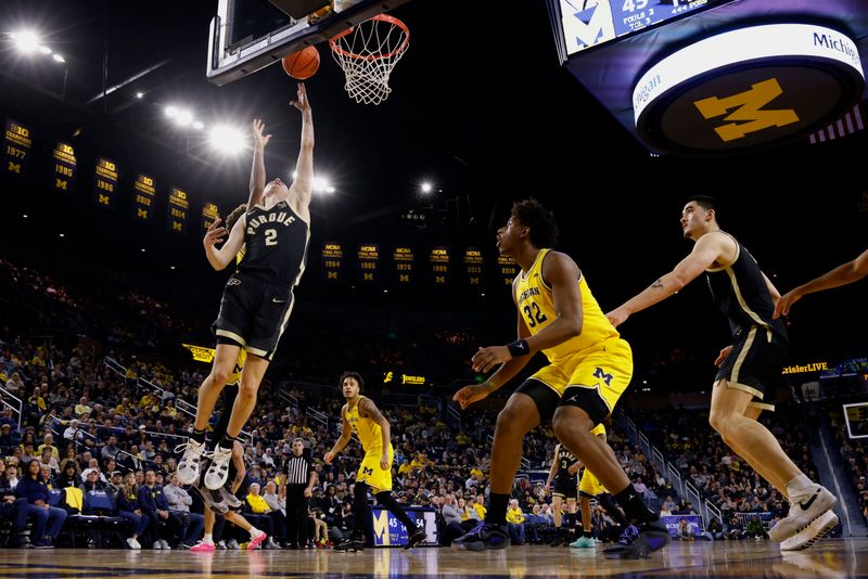 Feb 25, 2024; Ann Arbor, Michigan, USA;  Purdue Boilermakers guard Fletcher Loyer (2) shoots in the second half against the Michigan Wolverines at Crisler Center. Mandatory Credit: Rick Osentoski-USA TODAY Sports