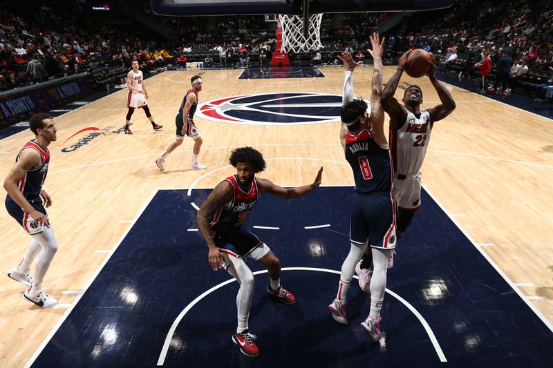 WASHINGTON, DC -? MARCH 31:  Jimmy Butler #22 of the Miami Heat drives to the basket during the game against the Washington Wizards on March 31, 2024 at Capital One Arena in Washington, DC. NOTE TO USER: User expressly acknowledges and agrees that, by downloading and or using this Photograph, user is consenting to the terms and conditions of the Getty Images License Agreement. Mandatory Copyright Notice: Copyright 2024 NBAE (Photo by Kenny Giarla/NBAE via Getty Images)