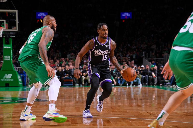 BOSTON, MA - APRIL 5:  Davion Mitchell #15 of the Sacramento Kings dribbles the ball during the game against the Boston Celtics on April 5, 2024 at the TD Garden in Boston, Massachusetts. NOTE TO USER: User expressly acknowledges and agrees that, by downloading and or using this photograph, User is consenting to the terms and conditions of the Getty Images License Agreement. Mandatory Copyright Notice: Copyright 2024 NBAE  (Photo by Brian Babineau/NBAE via Getty Images)