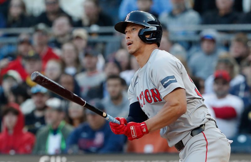 Apr 20, 2024; Pittsburgh, Pennsylvania, USA;  Boston Red Sox right fielder Rob Refsnyder (30) hits a double against the Pittsburgh Pirates during the ninth inning at PNC Park. Boston won 4-2. Mandatory Credit: Charles LeClaire-USA TODAY Sports