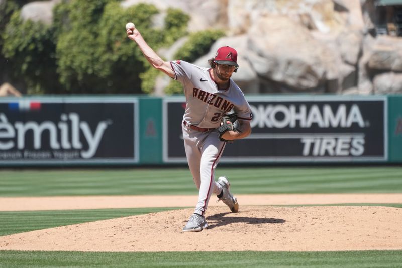 Jul 2, 2023; Anaheim, California, USA; Arizona Diamondbacks starting pitcher Zac Gallen (23) throws against the Los Angeles Angels at Angel Stadium. Mandatory Credit: Kirby Lee-USA TODAY Sports