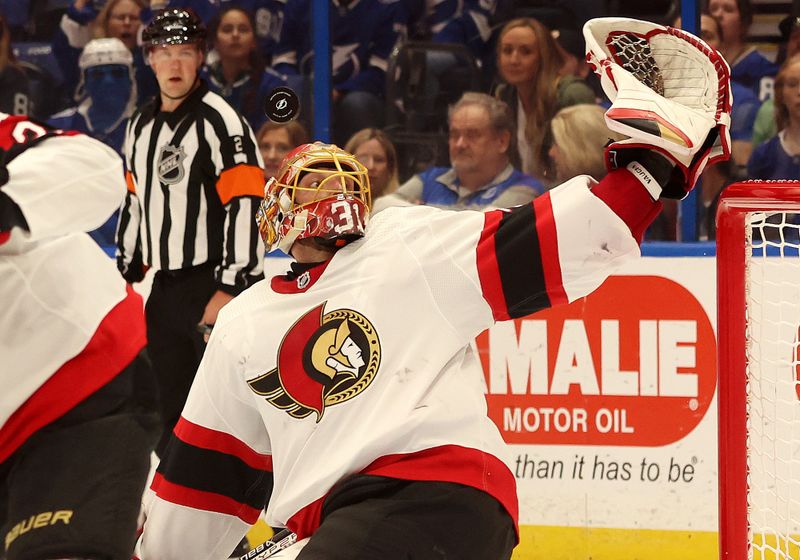 Apr 11, 2024; Tampa, Florida, USA; Ottawa Senators goaltender Anton Forsberg (31) defends against the Tampa Bay Lightning during the first period at Amalie Arena. Mandatory Credit: Kim Klement Neitzel-USA TODAY Sports