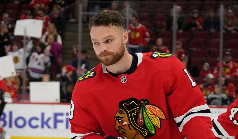 Jan 22, 2023; Chicago, Illinois, USA; Chicago Blackhawks center Max Domi (13) warms up before the game against the Los Angeles Kings at United Center. Mandatory Credit: David Banks-USA TODAY Sports