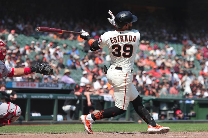 Aug 30, 2023; San Francisco, California, USA; San Francisco Giants second baseman Thairo Estrada (39) hits a single during the sixth inning against the Cincinnati Reds at Oracle Park. Mandatory Credit: Sergio Estrada-USA TODAY Sports