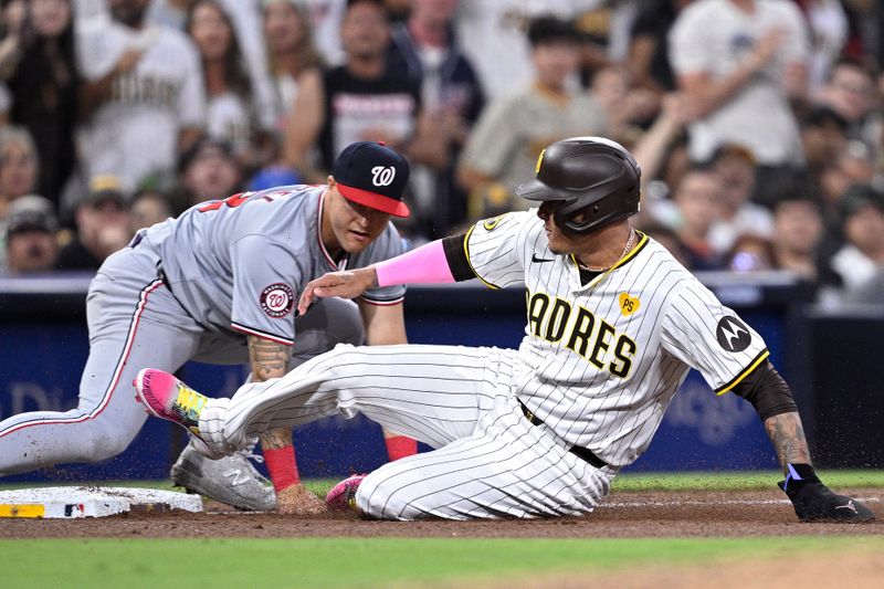 Jun 25, 2024; San Diego, California, USA; San Diego Padres third baseman Manny Machado (13) slides into third base during the fifth inning against the Washington Nationals at Petco Park. Mandatory Credit: Orlando Ramirez-USA TODAY Sports