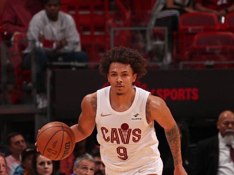 MIAMI, FL - MARCH 24: Craig Porter #9 of the Cleveland Cavaliers brings the ball up court during the game against the Miami Heat on March 24, 2024 at Kaseya Center in Miami, Florida. NOTE TO USER: User expressly acknowledges and agrees that, by downloading and or using this Photograph, user is consenting to the terms and conditions of the Getty Images License Agreement. Mandatory Copyright Notice: Copyright 2024 NBAE (Photo by Issac Baldizon/NBAE via Getty Images)