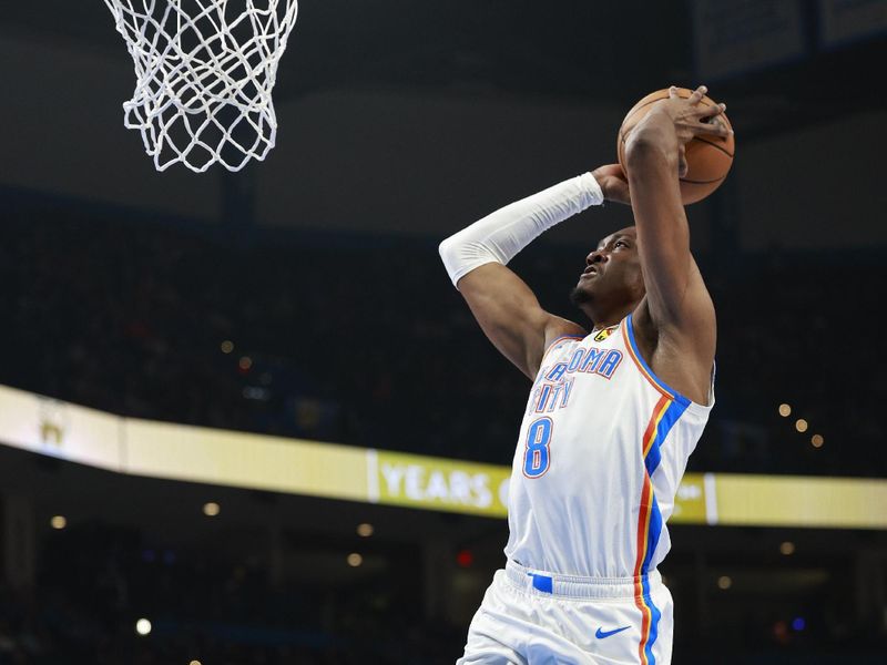 OKLAHOMA CITY, OK - MARCH 3: Jalen Williams #8 of the Oklahoma City Thunder dunks the ball during the game against the Houston Rockets on March 3, 2025 at Paycom Center in Oklahoma City, Oklahoma. NOTE TO USER: User expressly acknowledges and agrees that, by downloading and or using this photograph, User is consenting to the terms and conditions of the Getty Images License Agreement. Mandatory Copyright Notice: Copyright 2025 NBAE(Photo by Martin McGrew/NBAE via Getty Images)
