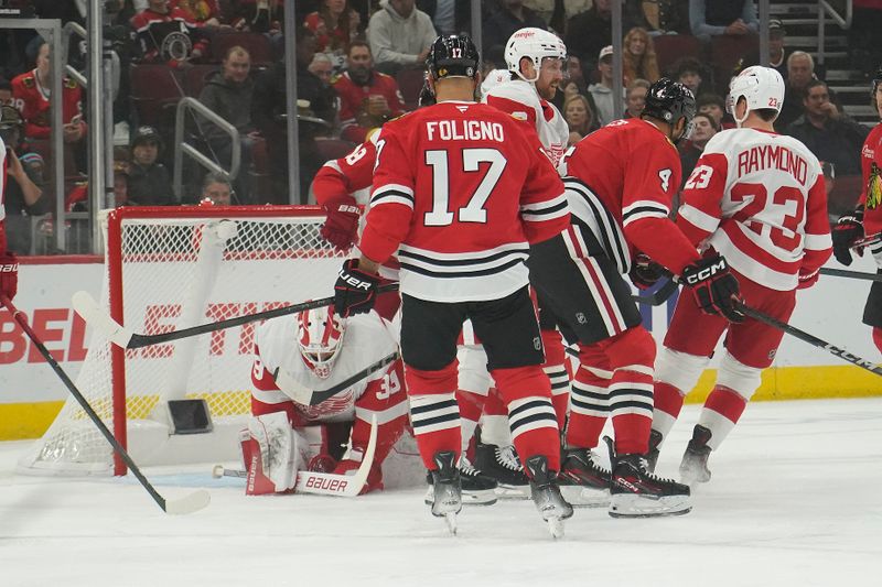 Nov 6, 2024; Chicago, Illinois, USA; Detroit Red Wings goaltender Cam Talbot (39) makes a save against the Chicago Blackhawks during the first period at United Center. Mandatory Credit: David Banks-Imagn Images