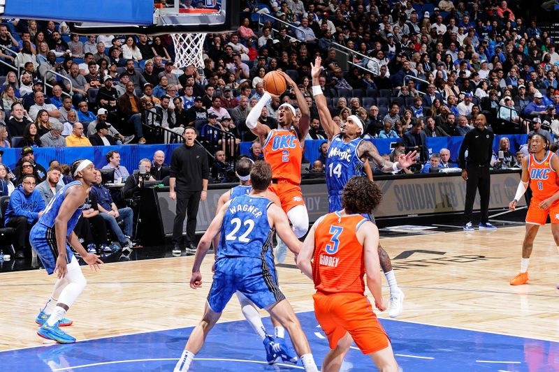 ORLANDO, FL - FEBRUARY 13: Shai Gilgeous-Alexander #2 of the Oklahoma City Thunder shoots the ball during the game against the Orlando Magic on February 13, 2024 at the Kia Center in Orlando, Florida. NOTE TO USER: User expressly acknowledges and agrees that, by downloading and or using this photograph, User is consenting to the terms and conditions of the Getty Images License Agreement. Mandatory Copyright Notice: Copyright 2024 NBAE (Photo by Fernando Medina/NBAE via Getty Images)