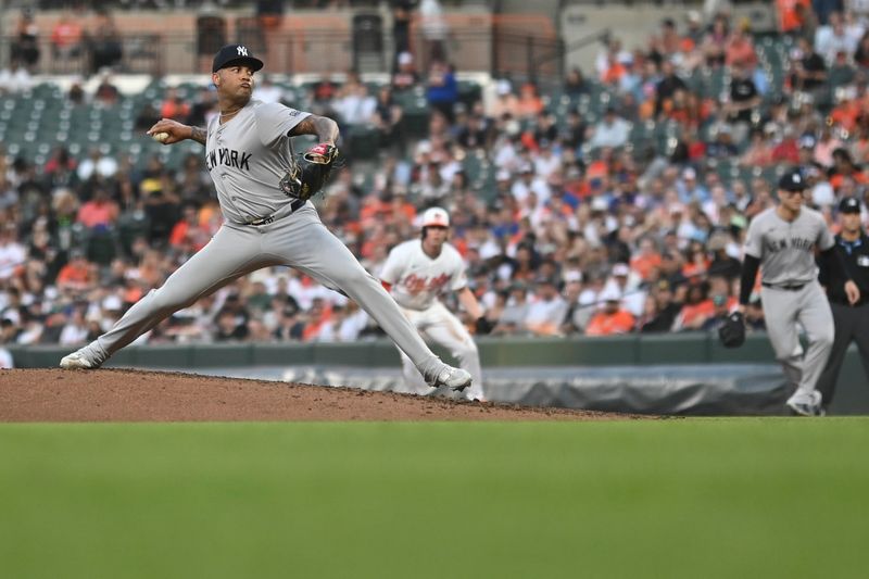 May 1, 2024; Baltimore, Maryland, USA;  New York Yankees pitcher Luis Gil (81) throws a third inning pitch as Baltimore Orioles outfielder Heston Kjerstad (13) takes a lead at Oriole Park at Camden Yards. Mandatory Credit: Tommy Gilligan-USA TODAY Sports