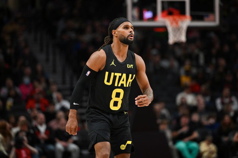 PORTLAND, OREGON - OCTOBER 18: Patty Mills #8 of the Utah Jazz looks on during the first half of the preseason game against the Portland Trail Blazers at Moda Center on October 18, 2024 in Portland, Oregon. NOTE TO USER: User expressly acknowledges and agrees that, by downloading and or using this photograph, User is consenting to the terms and conditions of the Getty Images License Agreement. (Photo by Alika Jenner/Getty Images)