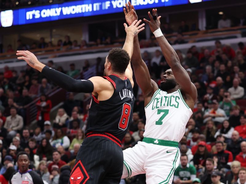 CHICAGO, ILLINOIS - NOVEMBER 29: Jaylen Brown #7 of the Boston Celtics shoots the ball against Zach LaVine #8 of the Chicago Bulls during the first quarter of the Emirates NBA Cup game at the United Center on November 29, 2024 in Chicago, Illinois. NOTE TO USER: User expressly acknowledges and agrees that, by downloading and or using this photograph, User is consenting to the terms and conditions of the Getty Images License Agreement.  (Photo by Luke Hales/Getty Images)