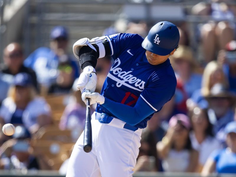 Mar 3, 2024; Phoenix, Arizona, USA; Los Angeles Dodgers designated hitter Shohei Ohtani against the Colorado Rockies during a spring training game at Camelback Ranch-Glendale. Mandatory Credit: Mark J. Rebilas-USA TODAY Sports