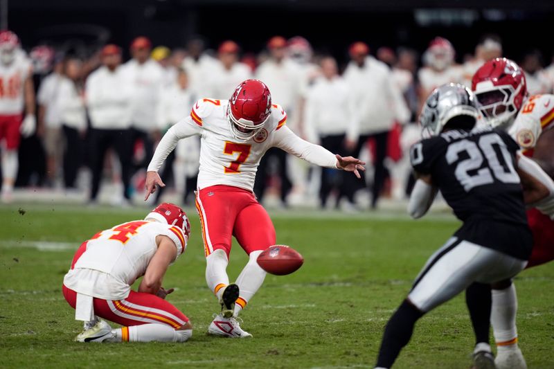 Kansas City Chiefs place-kicker Harrison Butker makes a 24-yard field goal during the second half of an NFL football game against the Las Vegas Raiders Sunday, Oct. 27, 2024, in Las Vegas. (AP Photo/John Locher)