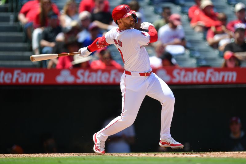 May 1, 2024; Anaheim, California, USA; Los Angeles Angels outfielder Taylor Ward (3) hits a single against the Philadelphia Phillies during the third inning at Angel Stadium. Mandatory Credit: Gary A. Vasquez-USA TODAY Sports
