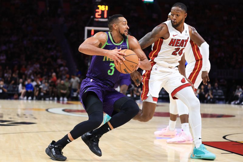 MIAMI, FLORIDA - JANUARY 01: CJ McCollum #3 of the New Orleans Pelicans drives to the basket against Haywood Highsmith #24 of the Miami Heat during the third quarter of the game at Kaseya Center on January 01, 2025 in Miami, Florida. NOTE TO USER: User expressly acknowledges and agrees that, by downloading and or using this photograph, User is consenting to the terms and conditions of the Getty Images License Agreement. (Photo by Megan Briggs/Getty Images)