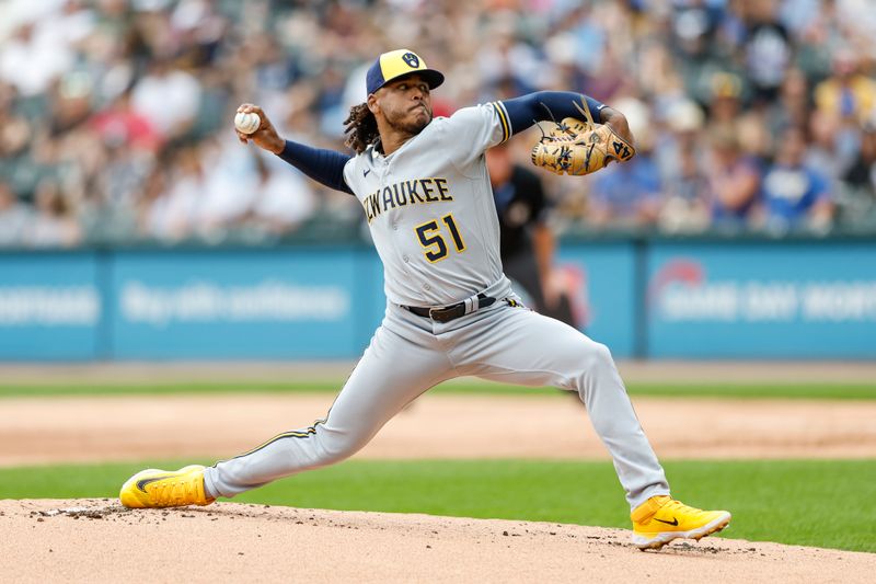 Aug 13, 2023; Chicago, Illinois, USA; Milwaukee Brewers starting pitcher Freddy Peralta (51) delivers a pitch against the Chicago White Sox during the first inning at Guaranteed Rate Field. Mandatory Credit: Kamil Krzaczynski-USA TODAY Sports