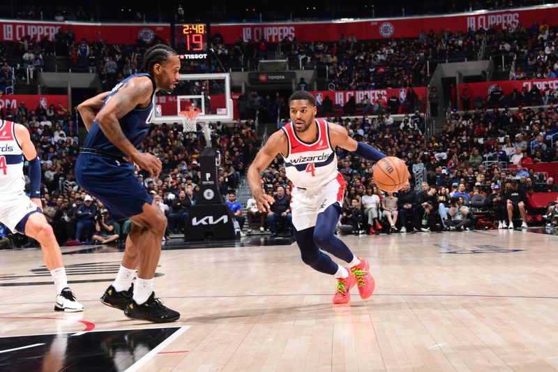 LOS ANGELES, CA - MARCH 1: Jared Butler #4 of the Washington Wizards dribbles the ball during the game against the LA Clippers on March 1, 2024 at Crypto.Com Arena in Los Angeles, California. NOTE TO USER: User expressly acknowledges and agrees that, by downloading and/or using this Photograph, user is consenting to the terms and conditions of the Getty Images License Agreement. Mandatory Copyright Notice: Copyright 2024 NBAE (Photo by Adam Pantozzi/NBAE via Getty Images)