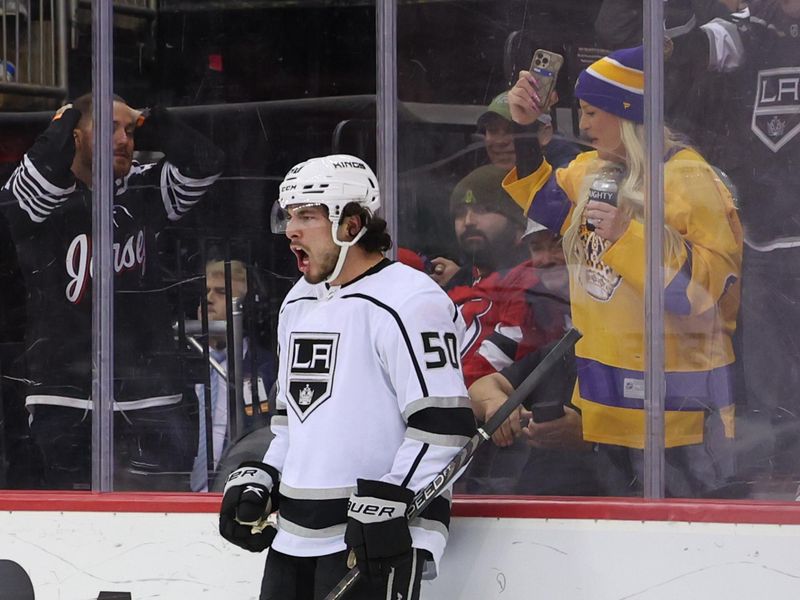 Feb 23, 2023; Newark, New Jersey, USA; Los Angeles Kings defenseman Sean Durzi (50) celebrates his goal against the New Jersey Devils during the third period at Prudential Center. Mandatory Credit: Ed Mulholland-USA TODAY Sports