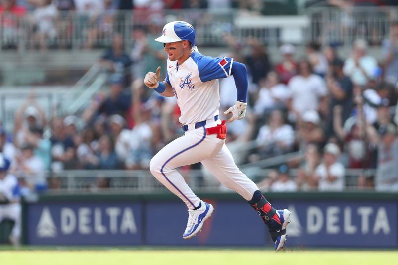 Jun 15, 2024; Cumberland, Georgia, USA; Atlanta Braves left fielder Jarred Kelenic (24) hits a home run against the Tampa Bay Rays during the fifth inning at Truist Park. Mandatory Credit: Mady Mertens-USA TODAY Sports