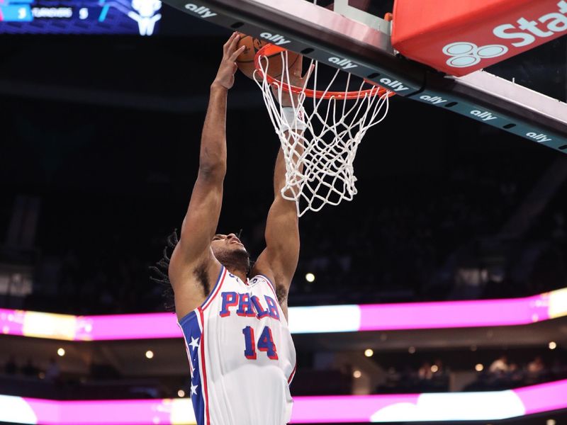 CHARLOTTE, NC - DECEMBER 3: Ricky Council IV #14 of the Philadelphia 76ers dunks the ball during the game against the Charlotte Hornets during an NBA Emirates Cup game on December 3, 2024 at Spectrum Center in Charlotte, North Carolina. NOTE TO USER: User expressly acknowledges and agrees that, by downloading and or using this photograph, User is consenting to the terms and conditions of the Getty Images License Agreement. Mandatory Copyright Notice: Copyright 2024 NBAE (Photo by Brock Williams-Smith/NBAE via Getty Images)