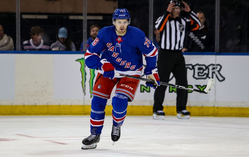 Sep 24, 2024; New York, New York, USA; New York Rangers left wing Brennan Othmann (78) skates against the New York Islanders during the first period at Madison Square Garden. Mandatory Credit: Danny Wild-Imagn Images