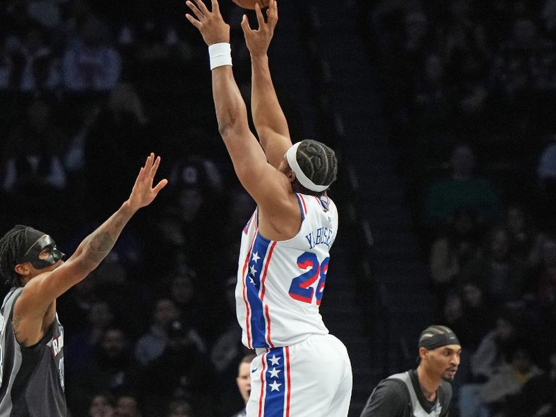 BROOKLYN, NY - FEBRUARY 12: Guerschon Yabusele #28 of the Philadelphia 76ers shoots the ball during the game against the Brooklyn Nets on February 12, 2025 at Barclays Center in Brooklyn, New York. NOTE TO USER: User expressly acknowledges and agrees that, by downloading and or using this Photograph, user is consenting to the terms and conditions of the Getty Images License Agreement. Mandatory Copyright Notice: Copyright 2025 NBAE (Photo by Jesse D. Garrabrant/NBAE via Getty Images)