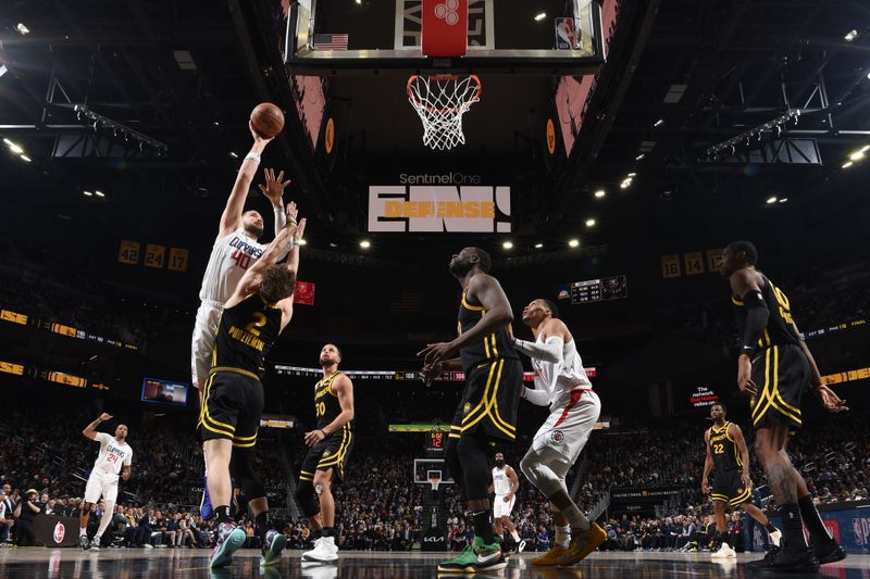 SAN FRANCISCO, CA - FEBRUARY 14: Ivica Zubac #40 of the LA Clippers drives to the basket during the game against the Golden State Warriors on FEBRUARY 14, 2024 at Chase Center in San Francisco, California. NOTE TO USER: User expressly acknowledges and agrees that, by downloading and or using this photograph, user is consenting to the terms and conditions of Getty Images License Agreement. Mandatory Copyright Notice: Copyright 2024 NBAE (Photo by Noah Graham/NBAE via Getty Images)