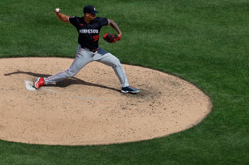 May 22, 2024; Washington, District of Columbia, USA; Minnesota Twins pitcher Jhoan Duran (59) pitches against the Washington Nationals during the ninth inning at Nationals Park. Mandatory Credit: Geoff Burke-USA TODAY Sports