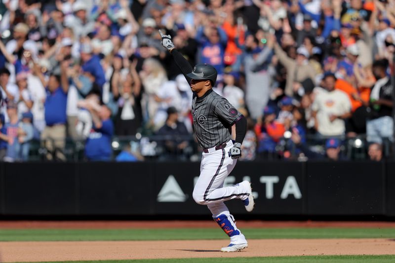 May 31, 2025; New York City, New York, USA; New York Mets right fielder Juan Soto (22) rounds the bases after hitting a solo home run against the Colorado Rockies during the fourth inning at Citi Field. Mandatory Credit: Brad Penner-Imagn Images