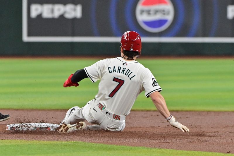 Apr 17, 2024; Phoenix, Arizona, USA;  Arizona Diamondbacks outfielder Corbin Carroll (7) steals second base in the first inning against the Chicago Cubs at Chase Field. Mandatory Credit: Matt Kartozian-USA TODAY Sports