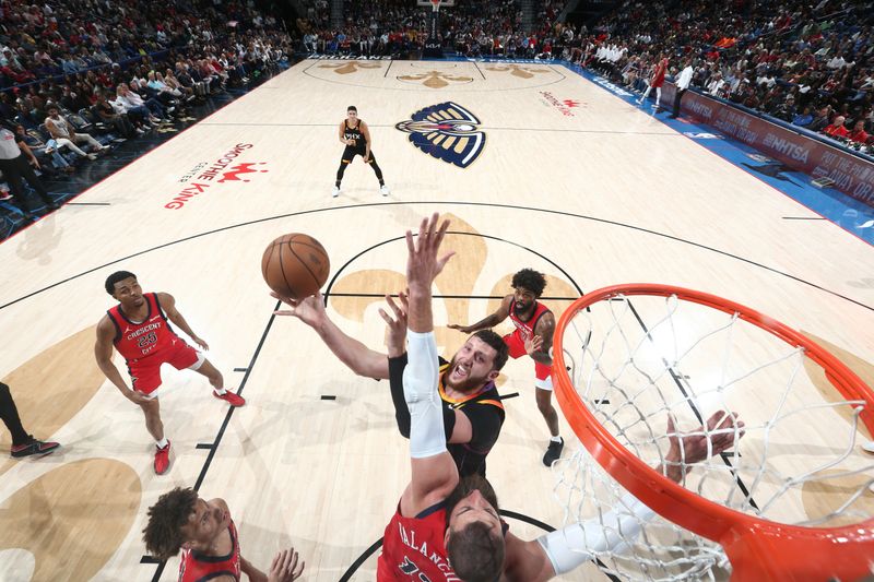 NEW ORLEANS, LA - APRIL 1:  Jusuf Nurkic #20 of the Phoenix Suns drives to the basket during the game against the New Orleans Pelicans on April 1, 2024 at the Smoothie King Center in New Orleans, Louisiana. NOTE TO USER: User expressly acknowledges and agrees that, by downloading and or using this Photograph, user is consenting to the terms and conditions of the Getty Images License Agreement. Mandatory Copyright Notice: Copyright 2024 NBAE (Photo by Layne Murdoch Jr./NBAE via Getty Images)